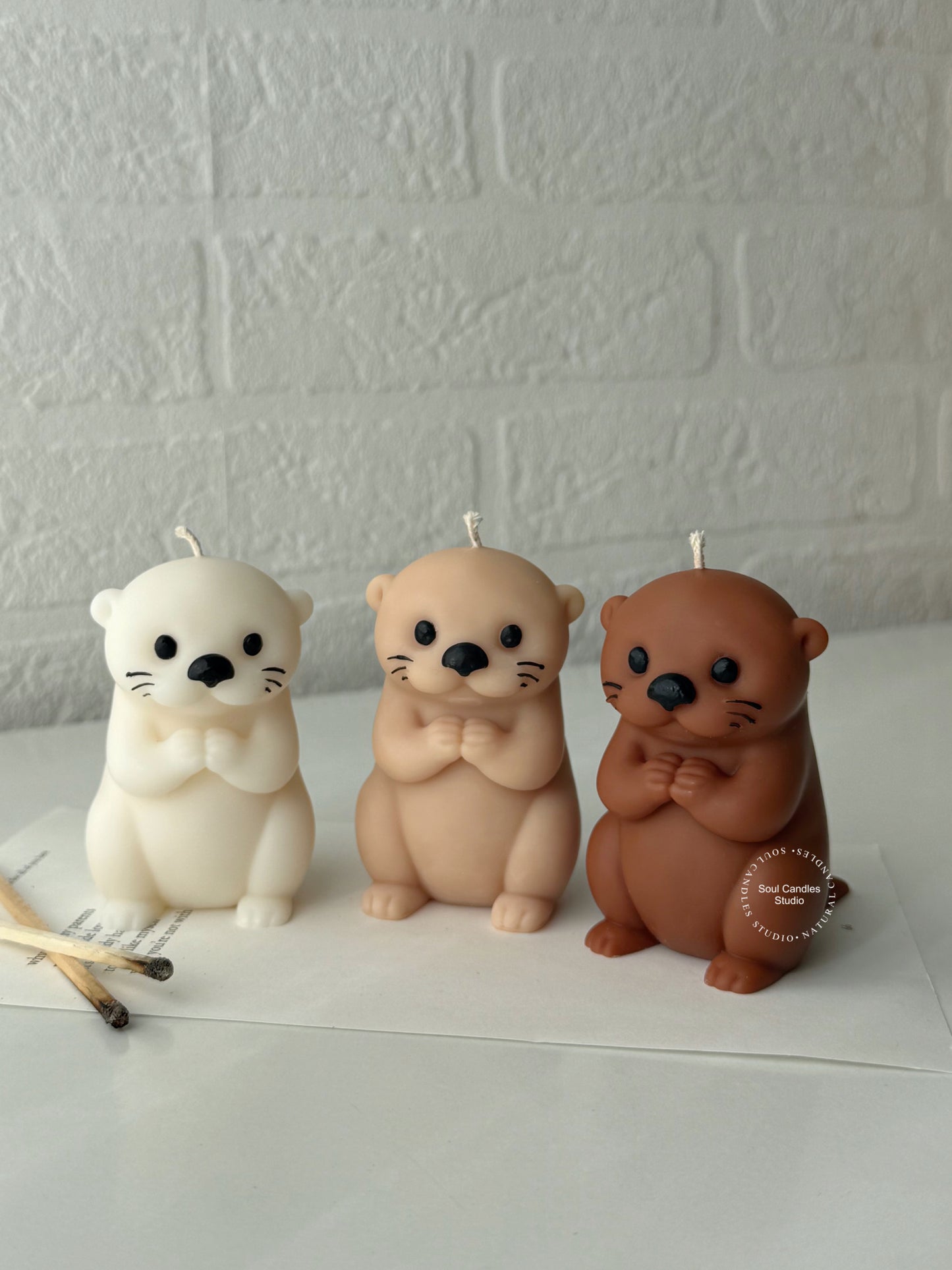 Otter Kerze